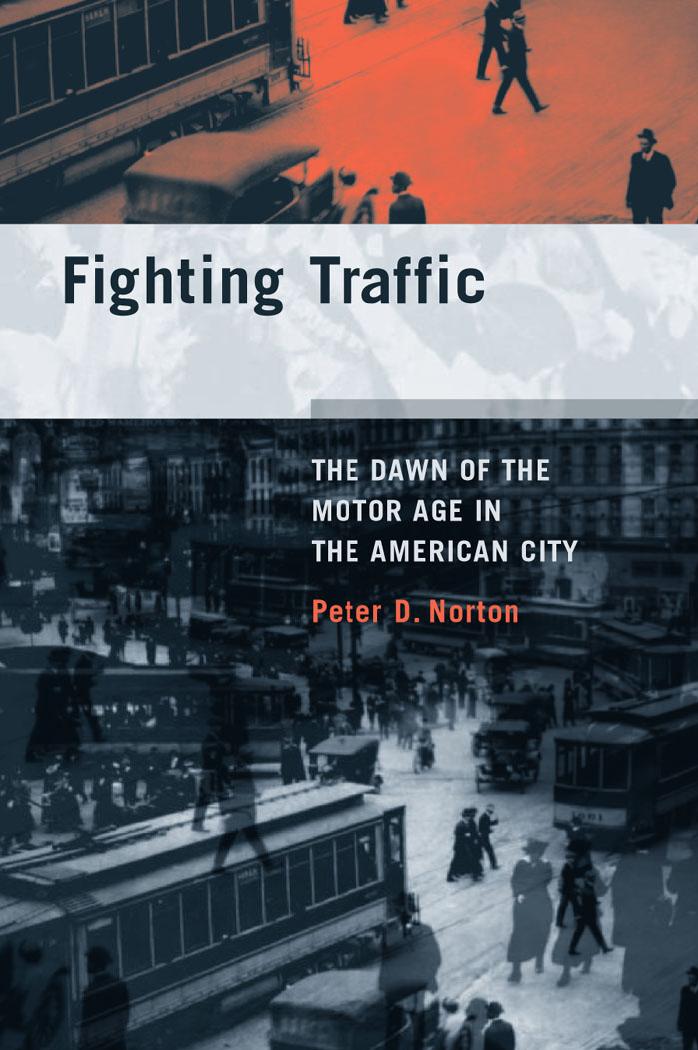 Fighting Traffic : The Dawn of the Motor Age in the American City